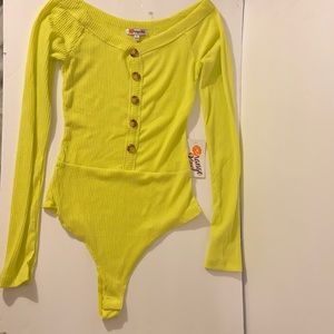 Neon yellow long sleeve sexy body suit. Size small. New with tags